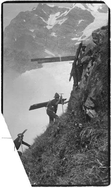 Image: Carrying timber towards Haast Ridge for building Haast hut
