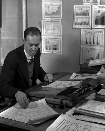 Image: Unidentified person with graphs and information for a census