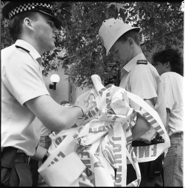 Image: Policemen with emergency tape, Queen Street, 1989