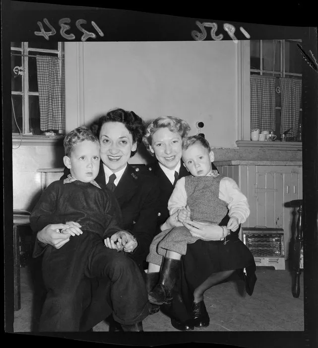 Two female constables (P Mathieson and G Fullwood) with two children