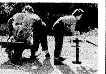 Image: bins training as members of the camp-fire brigade at the W.A.A.C. camv at Miramar. (Evening Post, 28 December 1944)