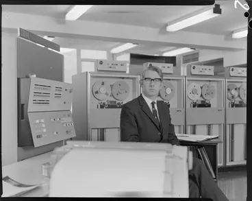 Image: Portrait of man with computers