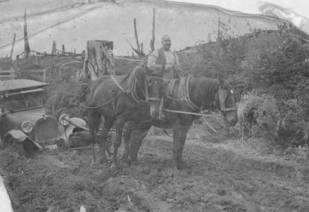 Harry Hunt pulling Hector Allely's car by horse