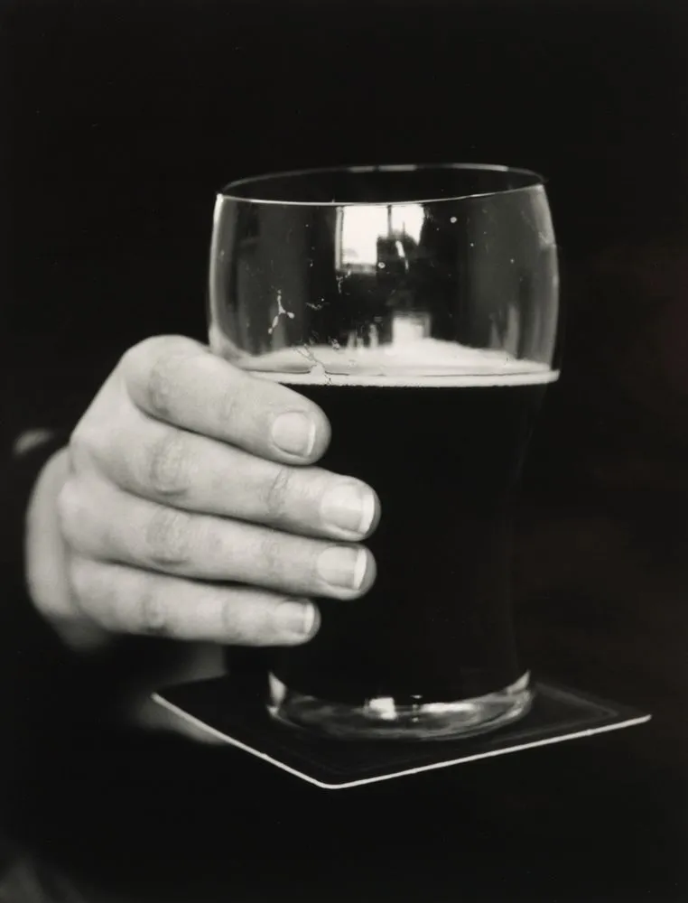 Untitled [Guinness glass and coaster]
