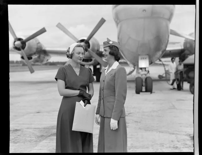 Pan American World Airways, unidentified woman and Air Hostess at Whenuapai Airbase, Auckland