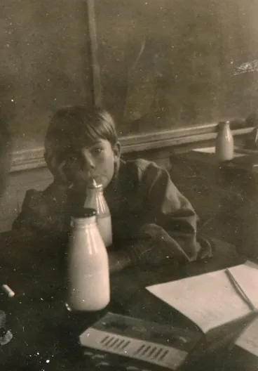 Image: Te Marua School; boy drinking milk; circa 1955