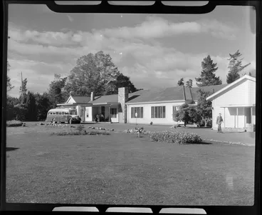 Image: Wairakei Hotel, Taupo, including a tourist bus parked outside entrance