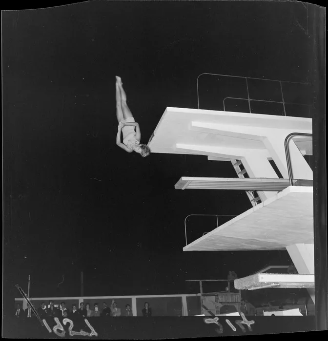 Mr G Fitzgerald, New Zealand diving champion demonstrates his skills at Naenae Swimming Pool, Lower Hutt