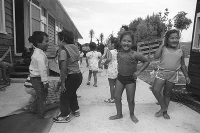Children playing outside. Opening of Kohanga Reo, Hoani Waititi Marae