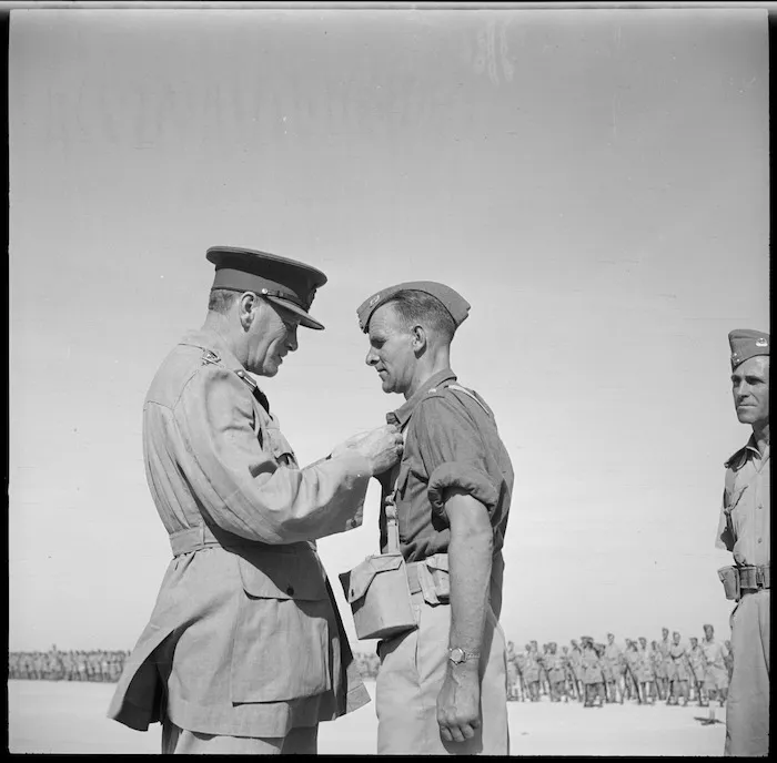 General Auchinleck decorating Major R J Lynch with MC