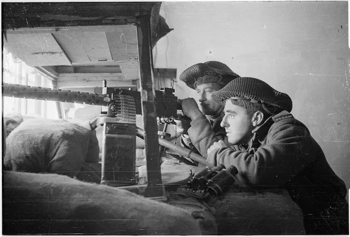 New Zealand soldiers with machine gun, at Faenza, Italy, during World War II - Photograph taken by George Kaye