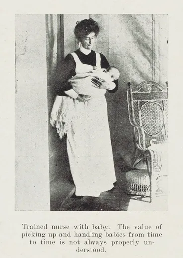 Trained nurse with baby. The value of picking up and handling babies from time to time is not always properly understood Image: Trained nurse with baby. The value of picking up and handling babies from time to time is not always properly understood