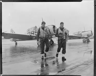Image: Cadet pilots A J King and C M Waters, after flight in a Harvard aircraft, Wigram, Christchurch