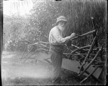 Image: Samuel Vaile in the garden of The Avenue, Karangahape Road, 1905