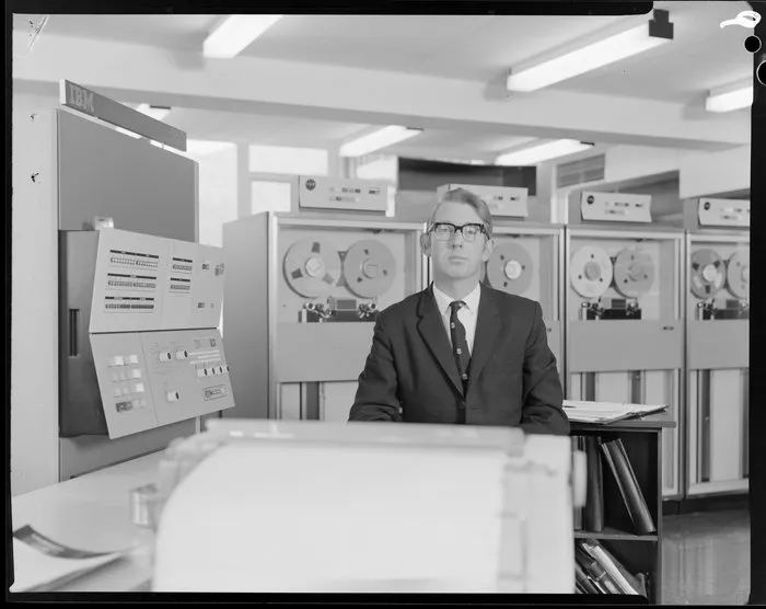 Portrait of man with computers