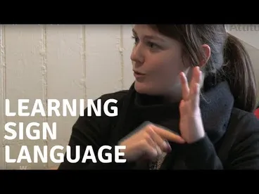 Image: Young girl learns Sign Language