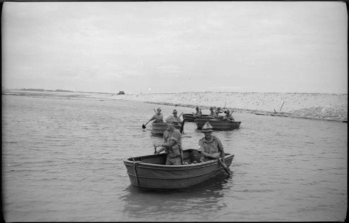 Assault party paddling light collapsible boats, Egypt