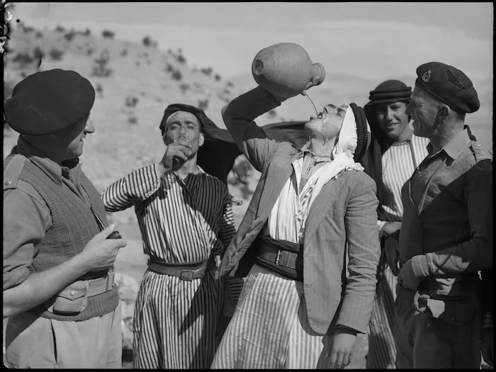 Members of NZ Divisional Cavalry with Syrian villagers, World War II - Photograph taken by H Paton
