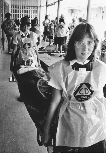 Image: Fergusson Intermediate; Civil Defence exercise; Lisa Donaldson, front, Patrice Hutchinson, rear; victim Oliver Thomson.