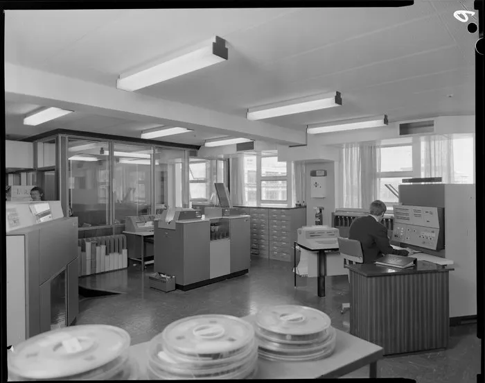 Portrait of man with computers