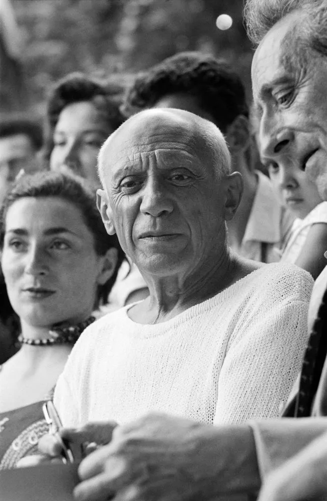 Pablo Picasso, Jacqueline Roque and Jean Cocteau at a bullfight, Vallauris, France