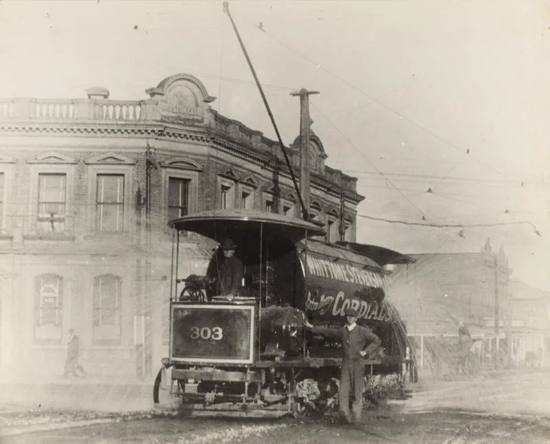 Water-sprinkler tram no. 303 at the intersection of Khyber Pass Road and Broadway