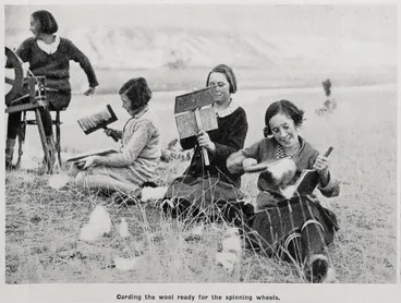 Image: Carding the wool ready for the spinning wheels