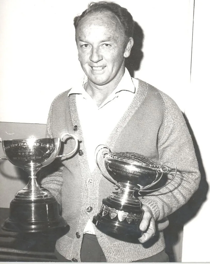 Mr Higgie with 2 N.Z. Deerstalkers Association photo trophies