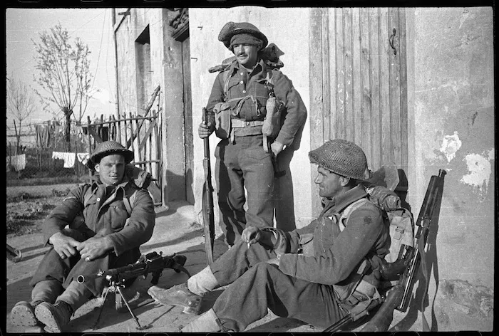 Members of New Zealand Infantry resting before advance, "D" day for the assault across the Senio River, Italy - Photograph taken by George Frederick Kaye