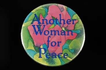 Image: Badge, "Another Woman for Peace"