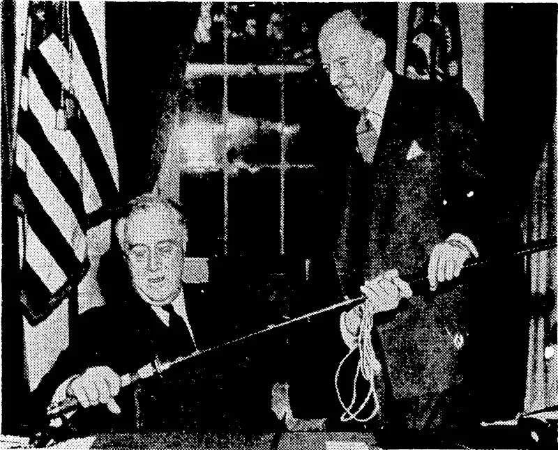A souvenir of the battle of the Baton Peninsula. President Roosevelt receiving the Samuri sword of a fallen Japanese officer from the United States High Commissioner to- the Philippines, a personal aj-ft from General Mac Arthur. (Evening Post, 29 May 1942)