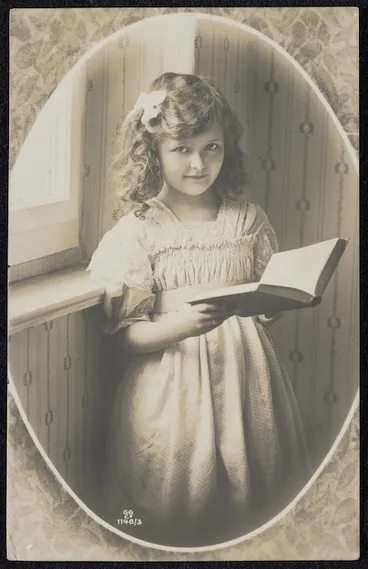 Image: Young girl with book. Printed in Prussia. GG Co. 1148/3 [Postcard to Sybil. ca 1910]
