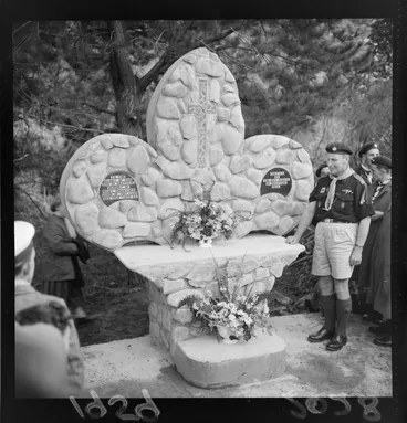 Image: Unidentified scout leader with a memorial dedicated to Mary Crowther, Moore's Valley, Wainuiomata
