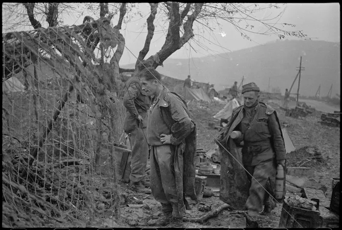 New Zealand gun crew alongside their camouflaged gun on the Italian Front, World War II - Photograph taken by George Kaye
