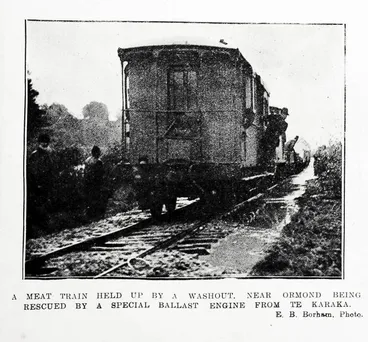 A meat train held up by a washout, near Ormond being rescued by a special ballast engine from Te Karaka Image: A meat train held up by a washout, near Ormond being rescued by a special ballast engine from Te Karaka