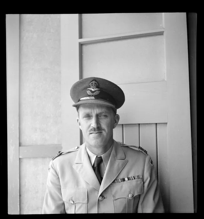 Portrait of RNZAF Squadron Leader RJ Gibbs, OBE, of BCOF headquarters Japan