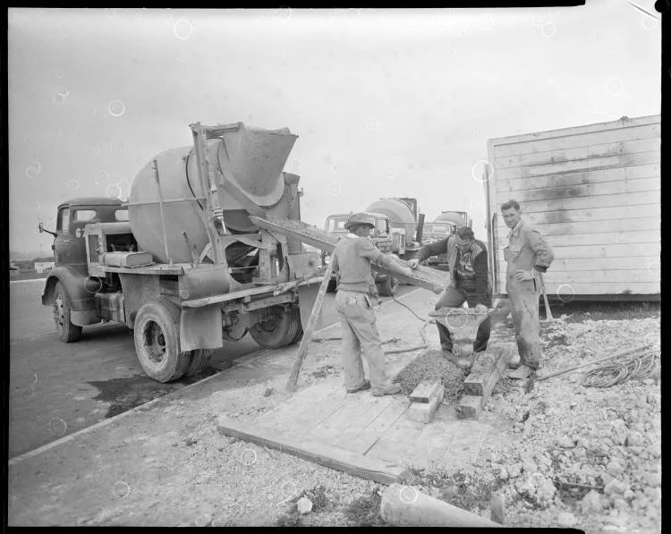 Pouring concrete at Apirana Avenue, Glen Innes