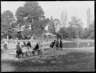 Image: Botanical Gardens, Christchurch, including girls playing on see-saws near pond