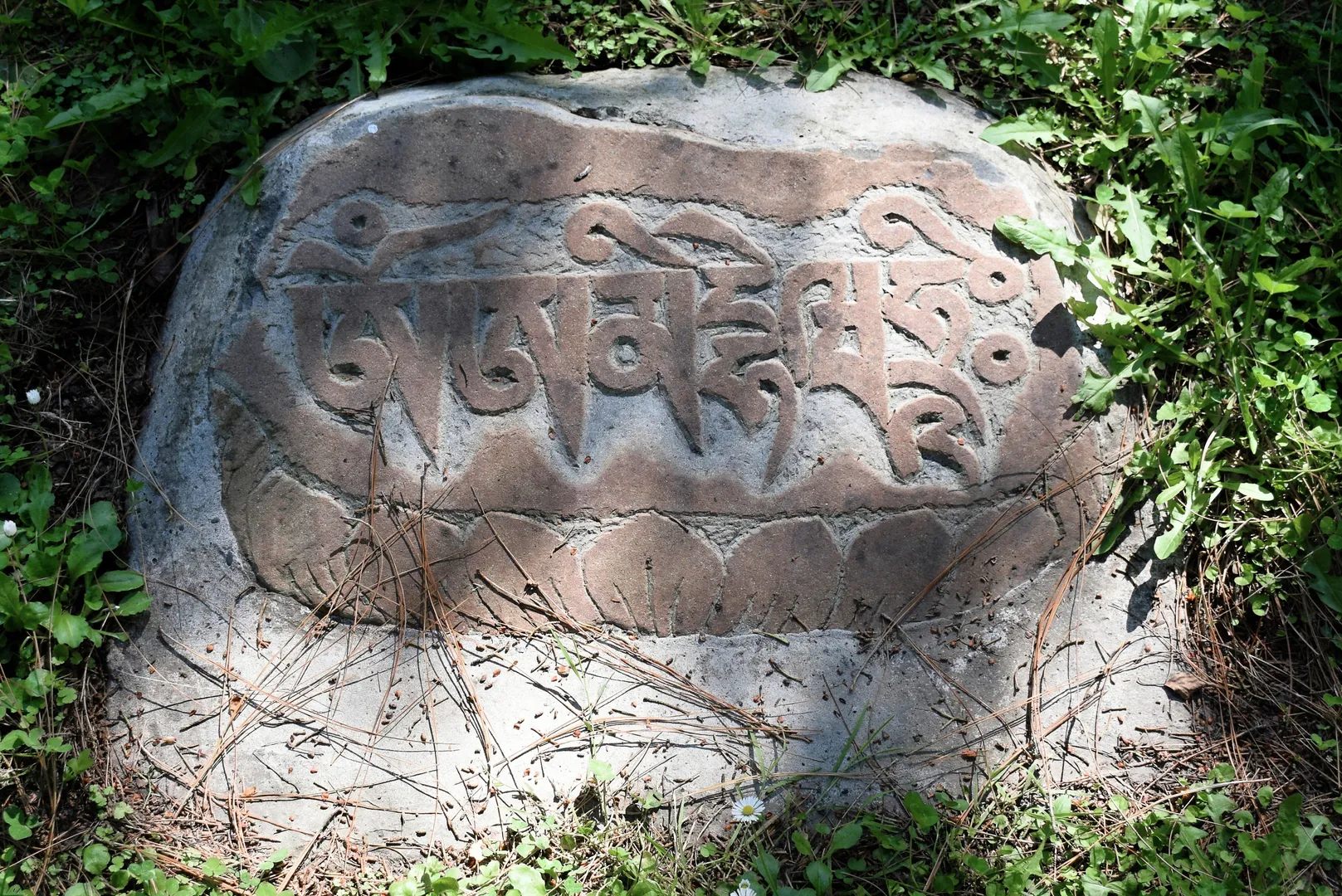 Tibetan Buddhist mani stone with mantra