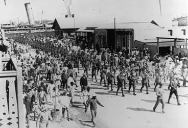 Image: Route march of the Advance Party NZEF at Noumea, August 20, 1914, on their way to Samoa.