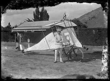 Image: Man standing beside 'Night Owl' bicycle-powered plane