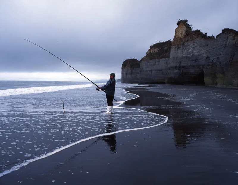 Tongaporutu Coastline - fisherman at Twin Creeks, 9 December 2003