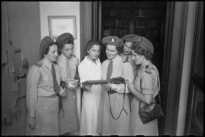 Curator of the Keats house explains memento of the poet to Tuis on leave in Rome, Italy, World War II - Photograph taken by George Kaye