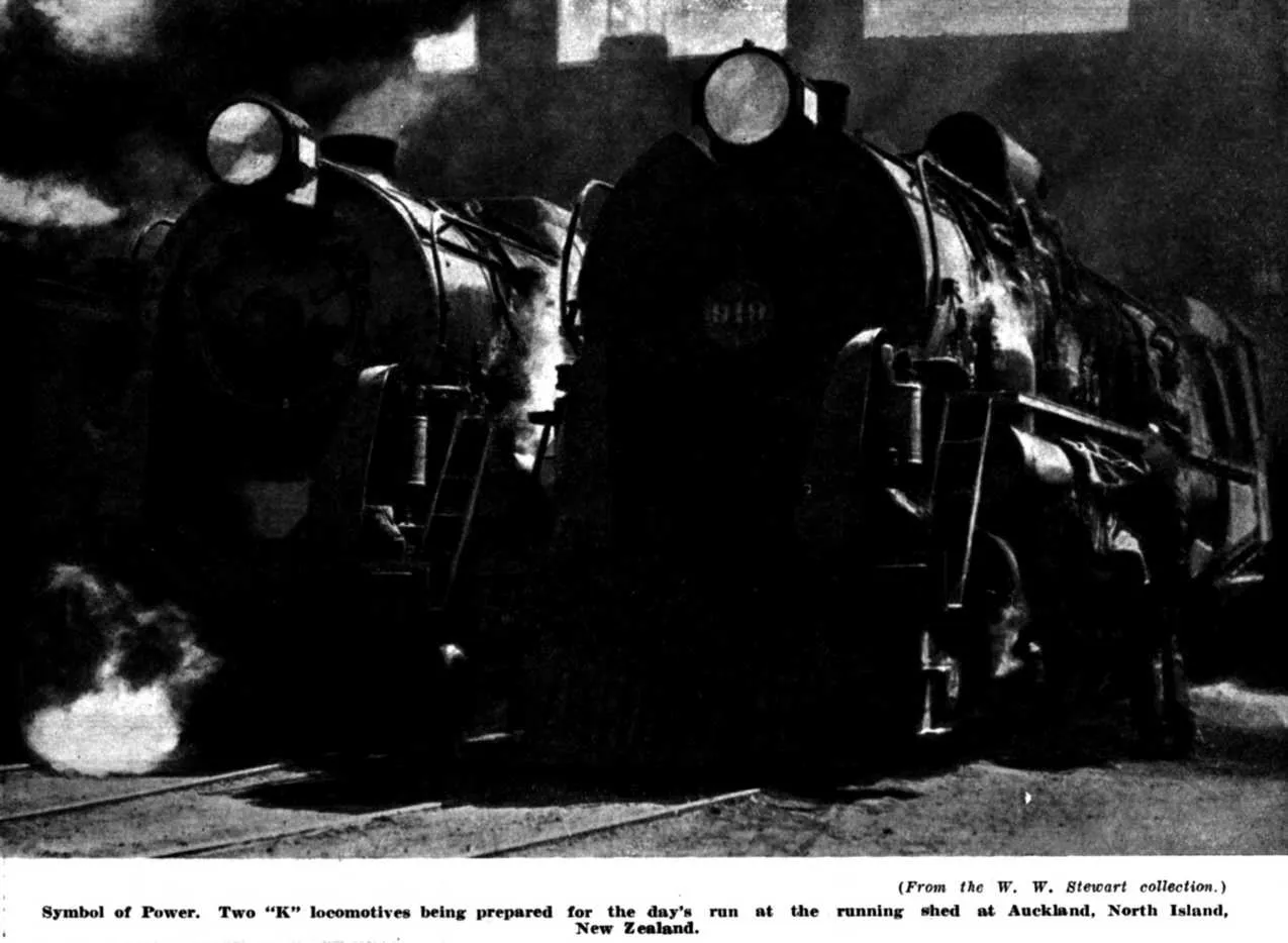 (From the W. W. Stewart collection.) — Symbol of Power. Two “K” locomotives being prepared for the day's run at the running shed at Auckland, North Island, New Zealand