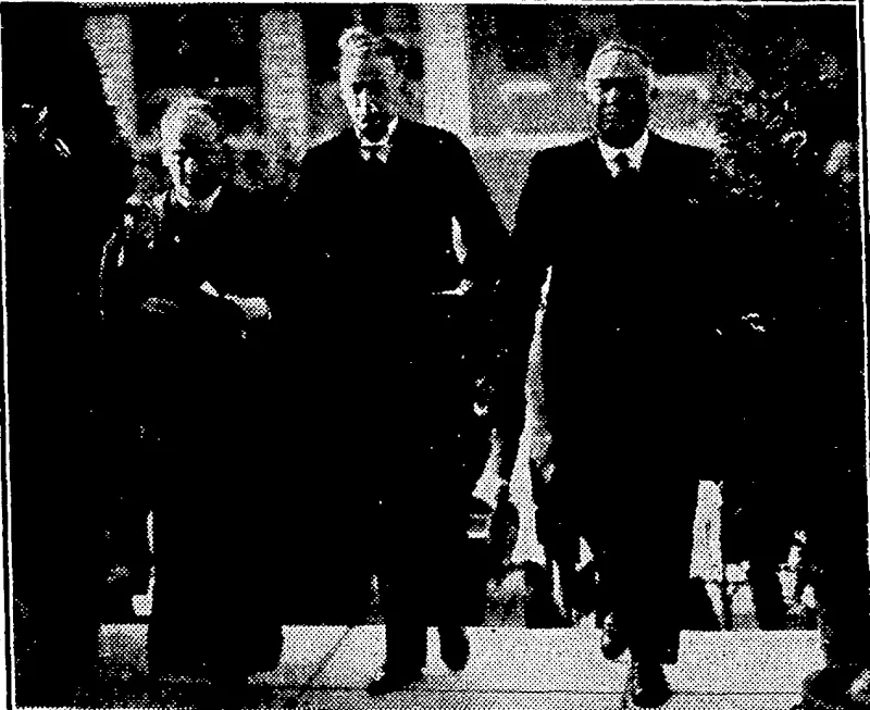 Evening Post" Miotc ARRIVAL OF THE MAYOR.—Mr. T. C. A.Hislop, Mayor of ' Wellington,-/arriving with the Rev. Canon Percival James and Mr. ■■■'■ ■ '''■■-.'. H. D. Bennett. ■ • -.; ":.: ■■..-; (Evening Post, 26 April 1932)