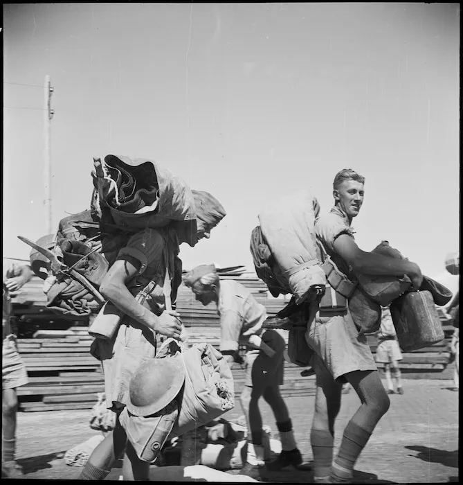 NZ soldiers loaded with equipment on Alexandria wharf ready to embark for Italy in World War II - Photograph taken by M D Elias
