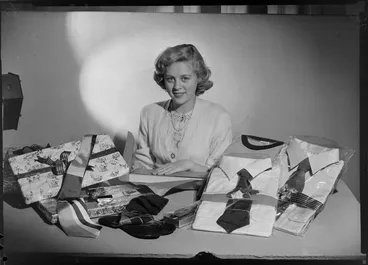 Image: Ann-Elizabeth wrapping Christmas gifts at Vance Vivians shop, Lambton Quay