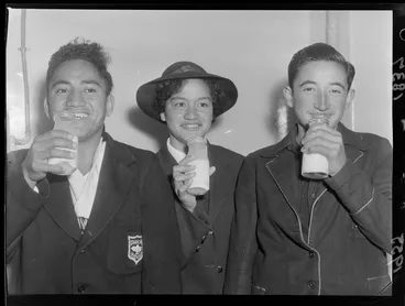 Image: Maori children from Tokomaru Bay District High School sample milk from bottles at the Wellington Municipal Milk Department