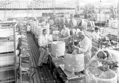 [Electric washing machine assembly factory interior]