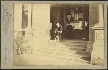 Image: "Victor" bicycle being ridden down steps of Chief Post Office, Wellington.